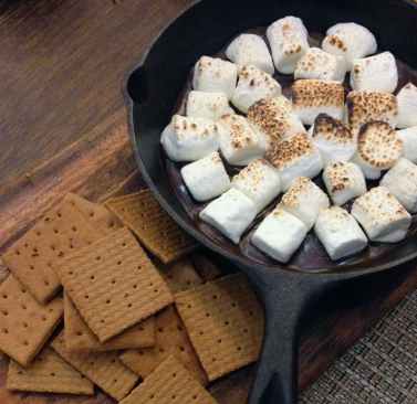 fried marshmallows on top of black steel nonstick frying pan